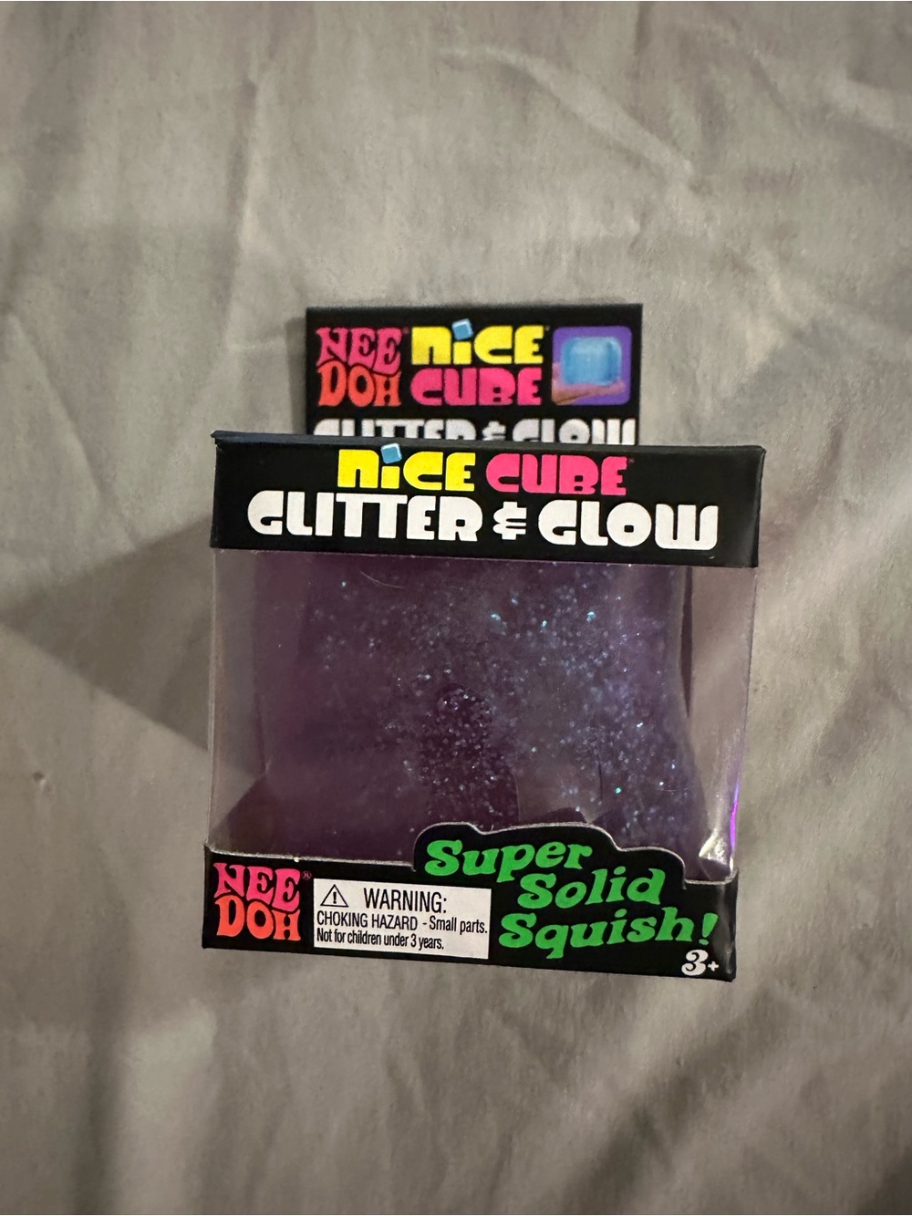 Needoh Nice Cube Glitter & Glow Super Solid Squish - Purple